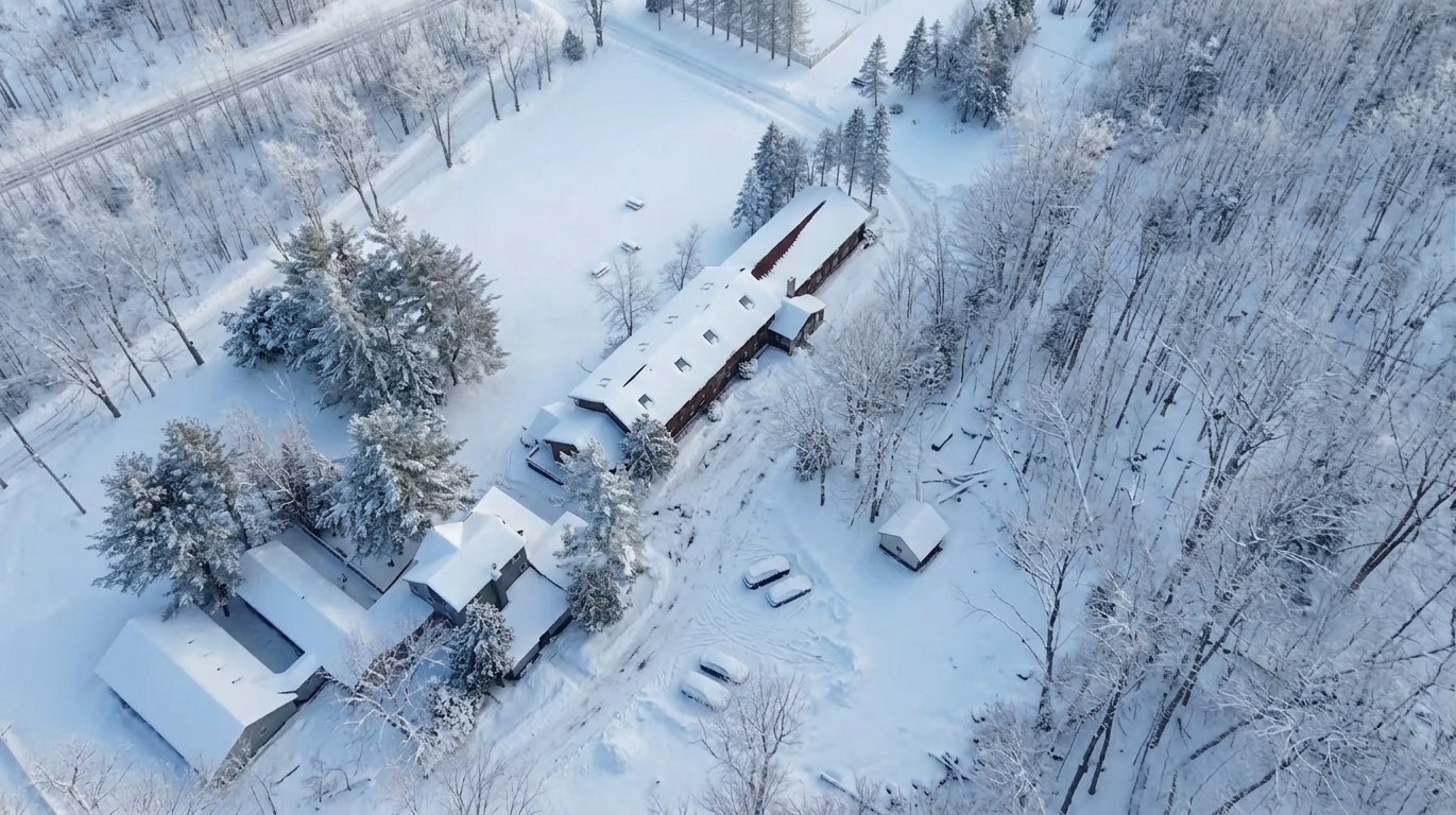 The retreat grounds covered in deep snow, seen from above